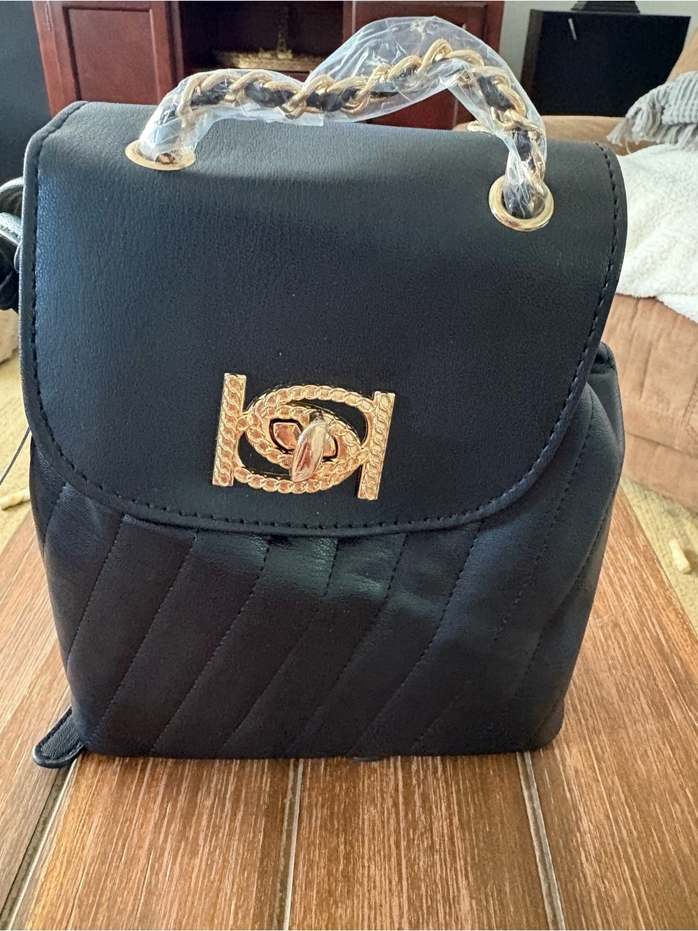 bebe Black Quilted Mini Backpack with Gold Chain Handle